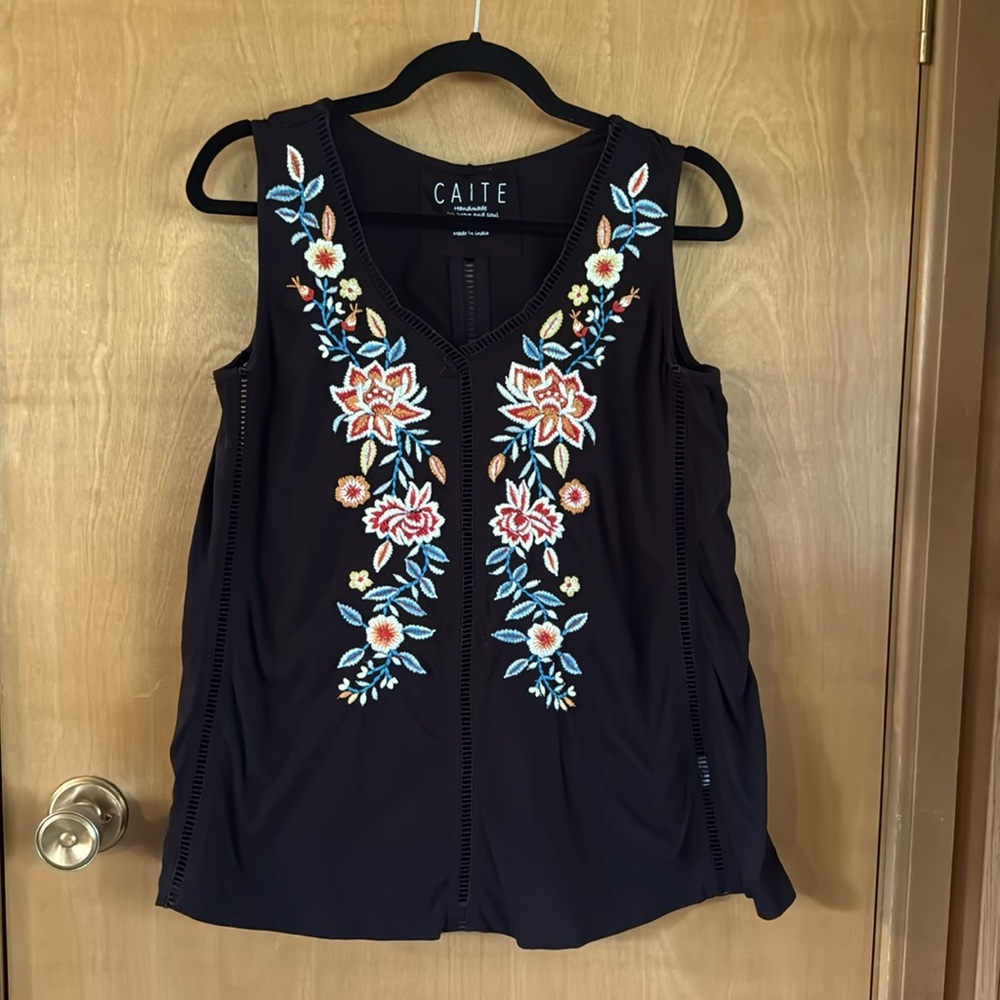 Caite embroidered top with ladder-style cut outs fits like S/M